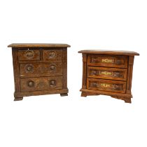 A 17th century style miniature oak chest of drawers, with an arrangement of three drawers flanked by