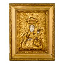 A mid 20th century icon - pressed metal with a gilt finish depicting the Holy Mother and Child, 29cm