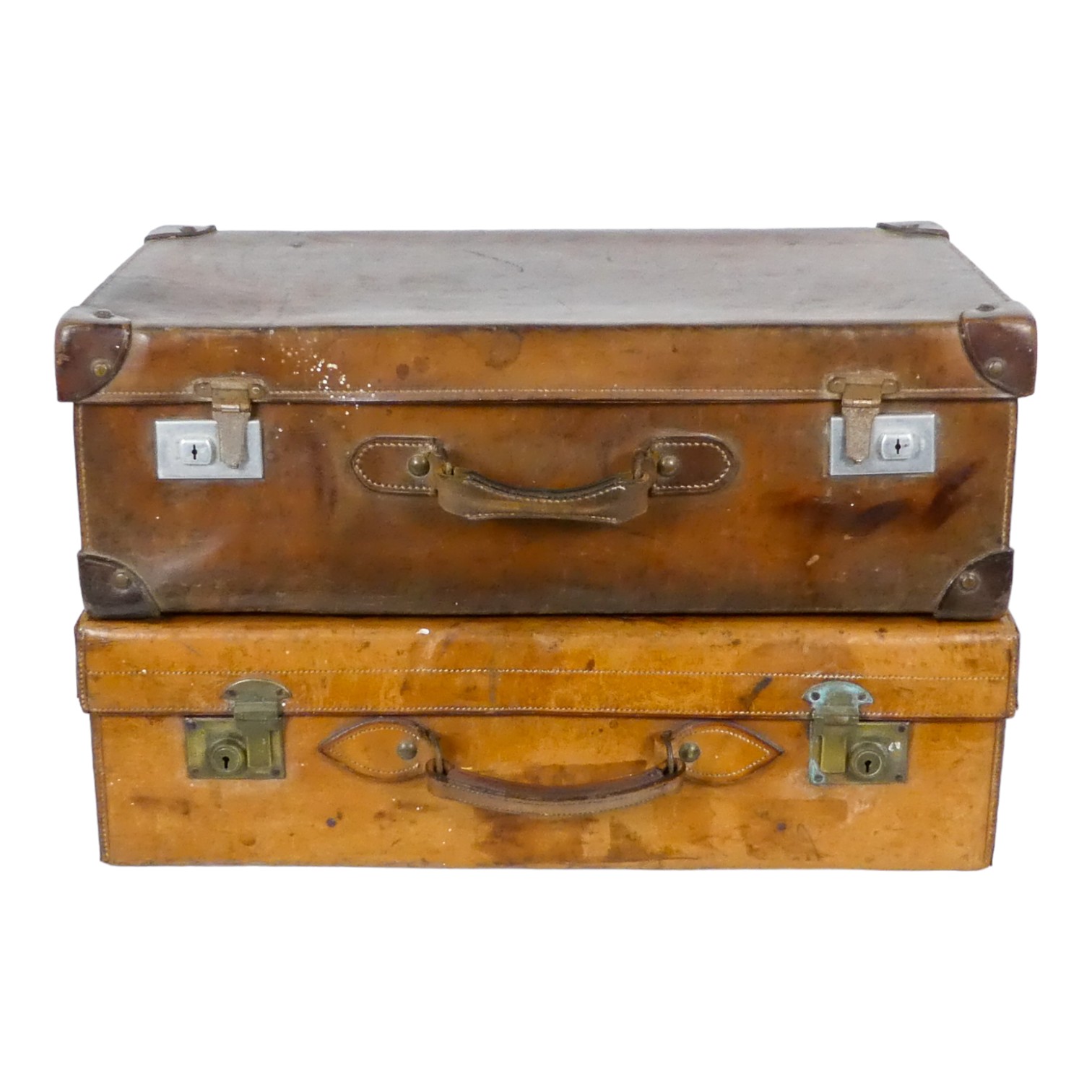 An early 20th century tan leather suitcase - with interesting luggage labels, together with