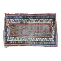 A Persian rug - with a central tree pattern on a green ground within a broad leaf border, 120 x