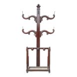 A Victorian mahogany hall stand - with an arrangement of serpentine arms fitted with pegs above a