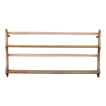 An Ercol hanging plate rack - Golden Dawn, model 268, the rack having two graduating shelves with