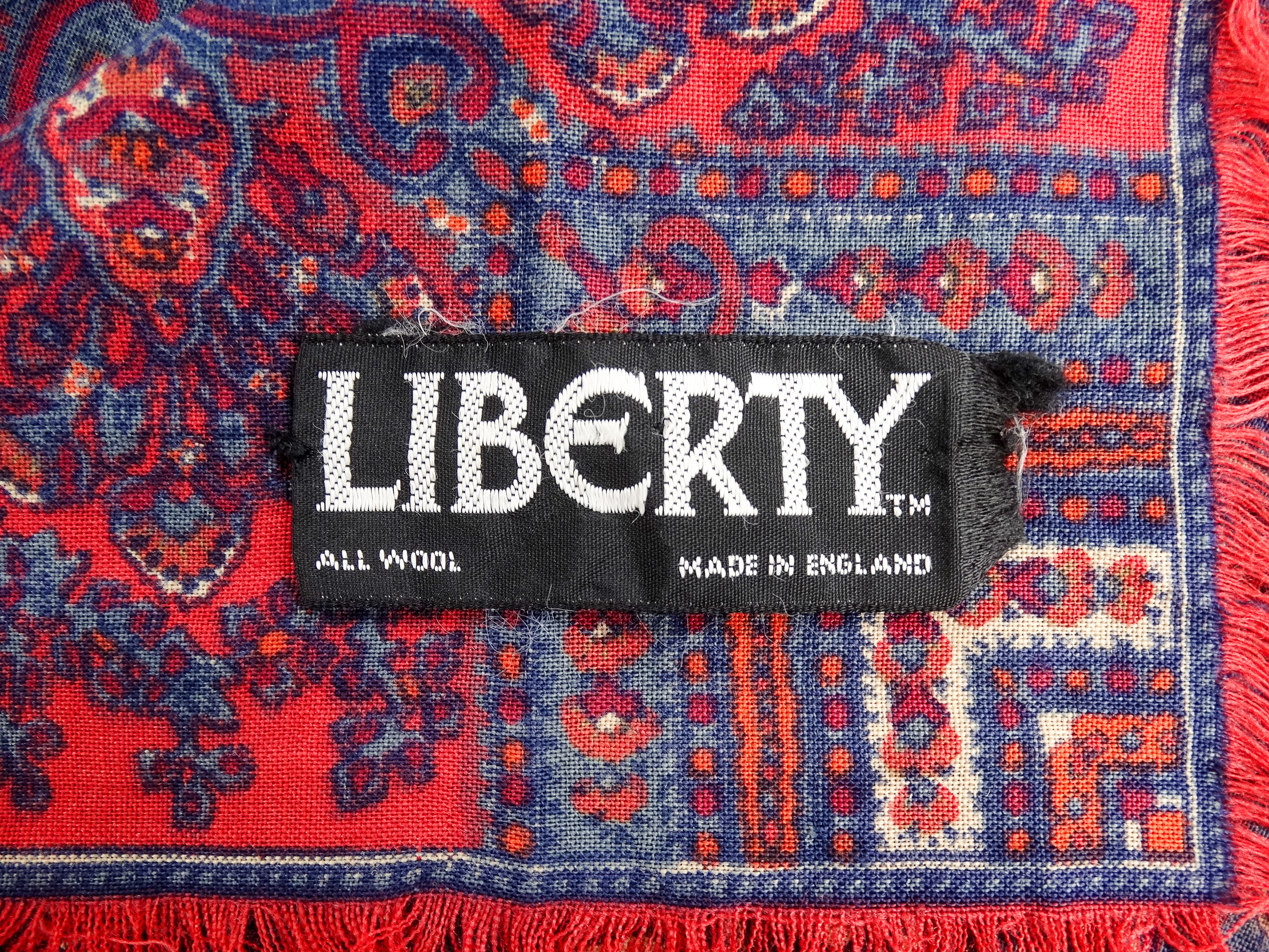 A wool shawl by Liberty - with a red and blue paisley pattern, 130 x 130cm. - Image 4 of 4