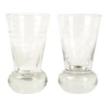 A pair of Freemasons centenary glasses - with etched decoration, height 11cm.