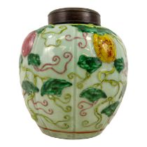 A Chinese gourd shaped ginger jar - decorated with vines and fruit, with impressed character mark to