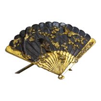 A Japanese Meiji period bronze and gilt place marker - in the form of a fan, decorated with birds