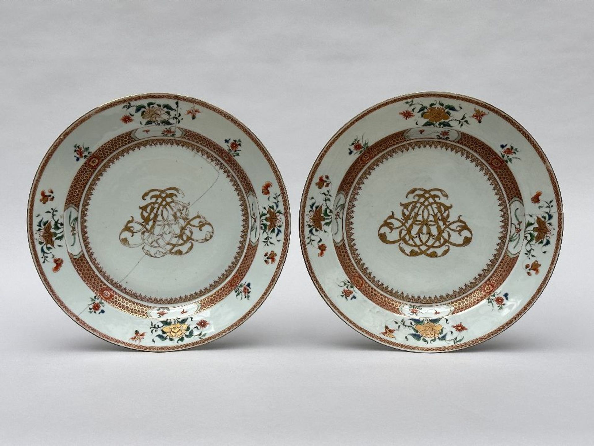 A pair of Chinese famille verte dishes with monogram of Louis Bernaert, accountant of the Ostend Com