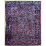 Persian rug with floral decoration on a red background