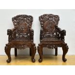 A pair of Japanese armchairs in carved wood 'dragons'