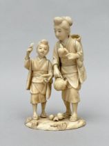 Japanese okimono 'Mother and child', Meji period (signed)
