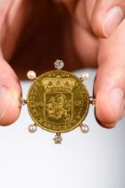 Dutch gold coin '14 gulden' (1760) mounted as a brooch with diamonds and pearls