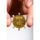 Dutch gold coin '14 gulden' (1760) mounted as a brooch with diamonds and pearls