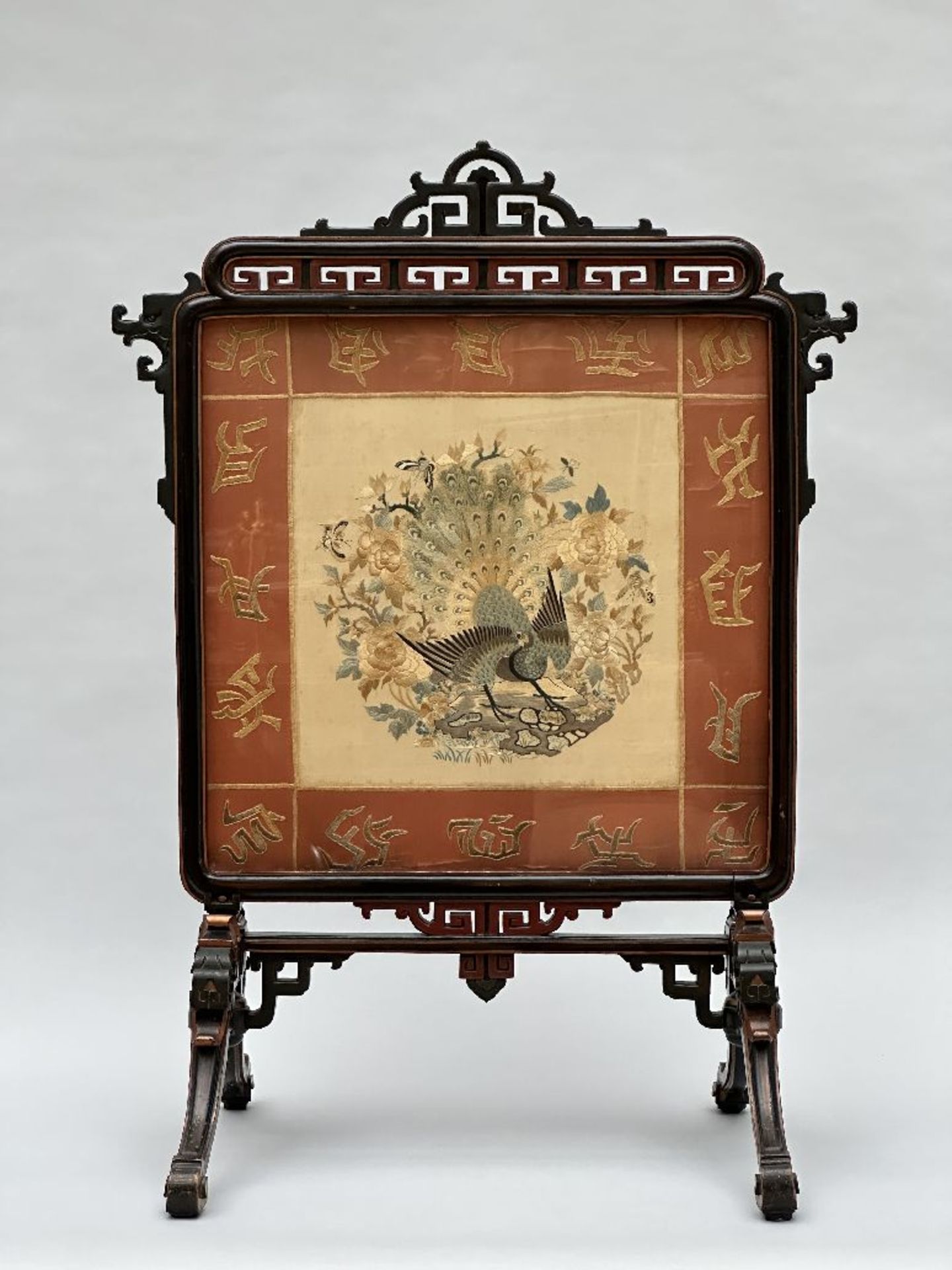A 'chinoisant' screen with silk fragment