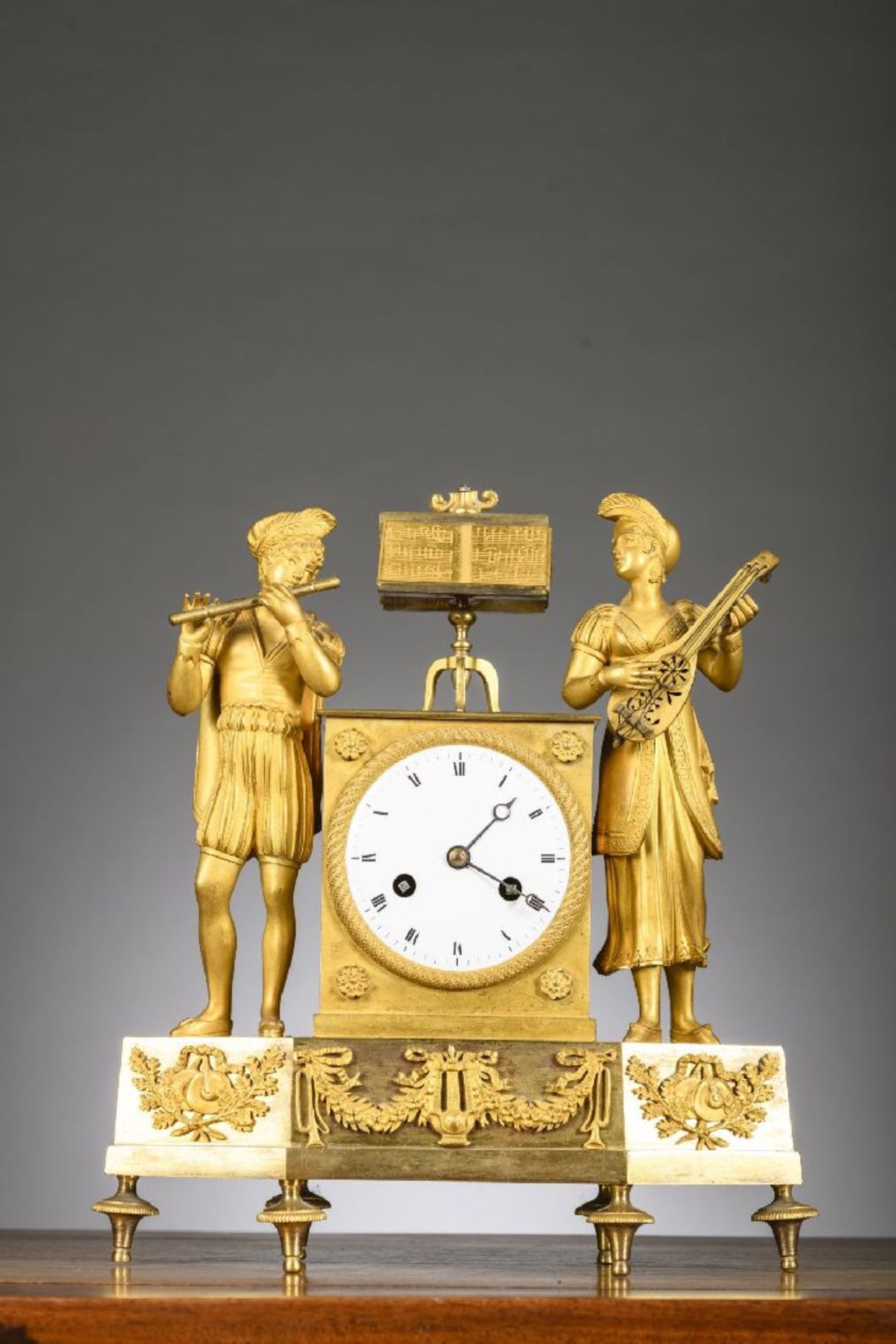 Empire clock in gilt bronze 'musicians'