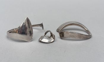 A collection of silver jewelry: Hans Hansen bracelet and Frank Ahm ring and bracelet