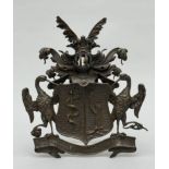 A bronze coat of arms of the Finnish noble family von Haartman with their motto 'Utrumque experient