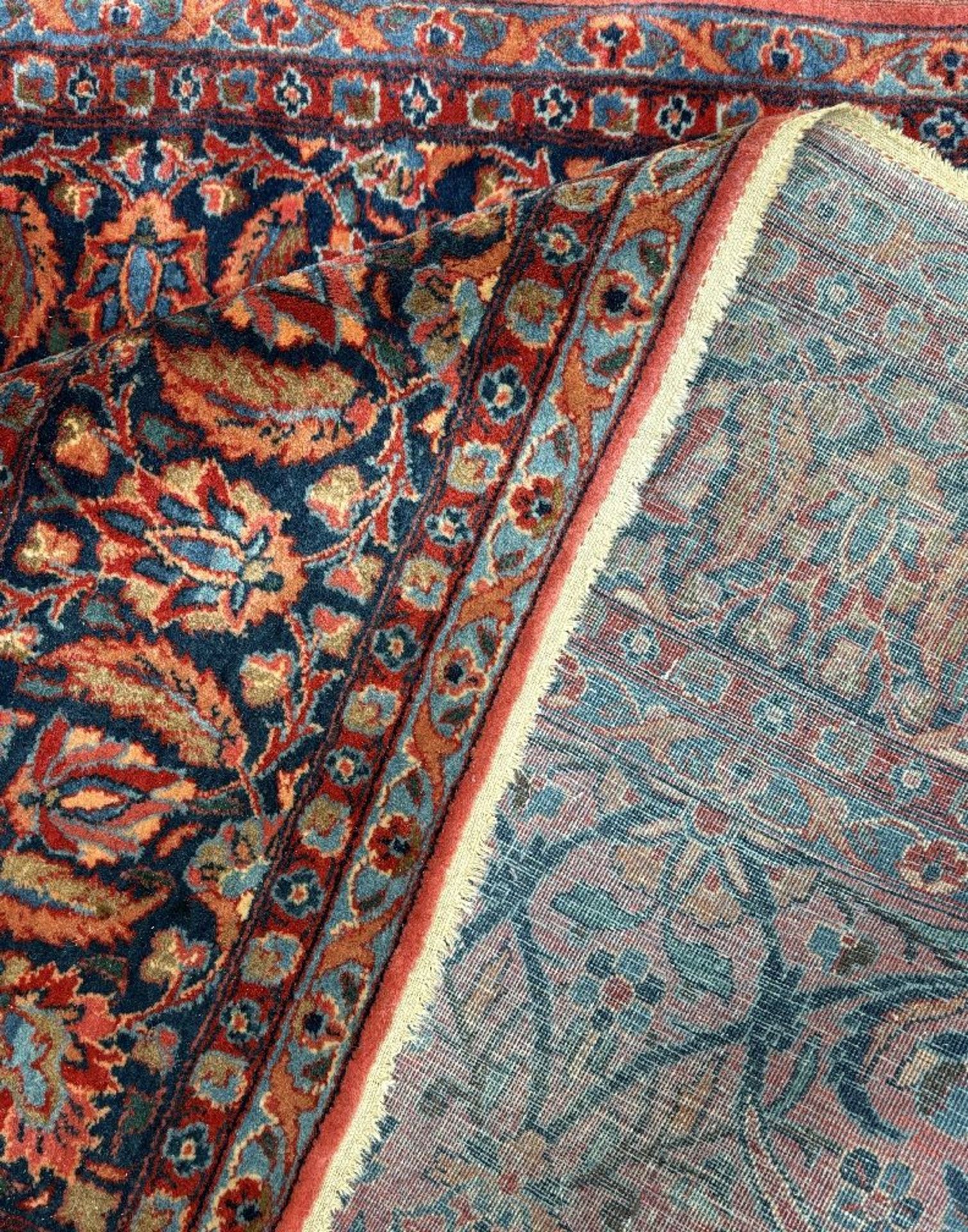 Persian rug with floral decoration on a red background - Image 3 of 4