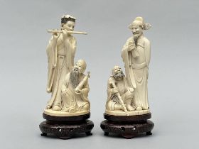 A pair of Taoist statues 'immortals', China circa 1900