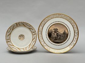 Lot: charger 'dog chariot' by Dihl Paris and a pair of Sèvres dishes with relief decoration