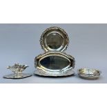 A collection of silver pieces: three dishes, vegetable tureen and sauce boat in Louis XV style