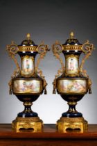 A pair of Sèvres porcelain vases with gilt bronze mounts, 19th century (*)