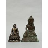 Burmese Buddha in bronze and a silver Buddha statue