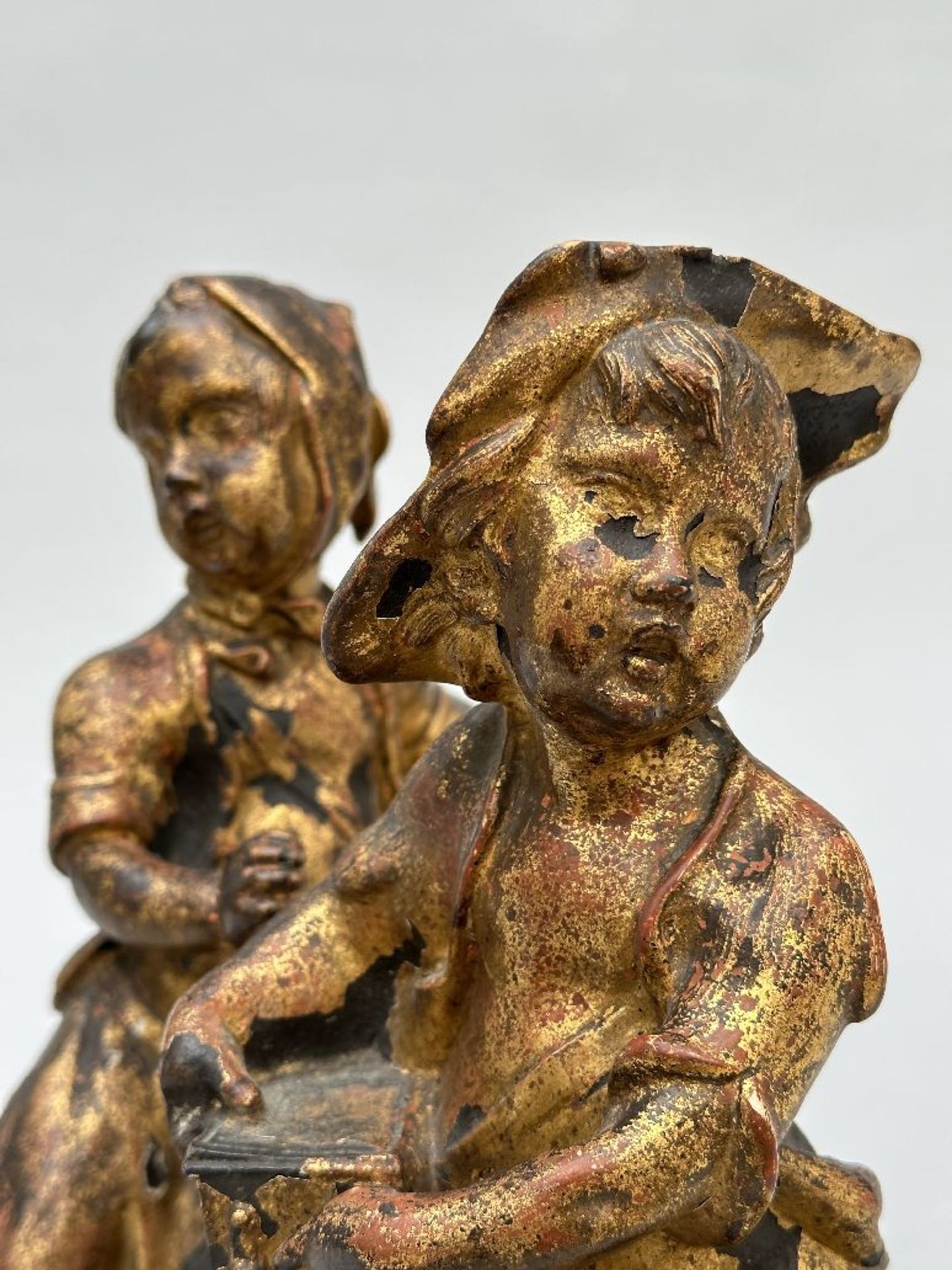 A pair of gilded cast iron figurines 'boy and girl', France 18th century - Image 5 of 5