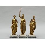 Three gilt bronze statues on marble base 'Greek gods'