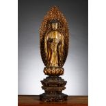 Japanese standing Buddha in gilded lacquer, 19th century (*)