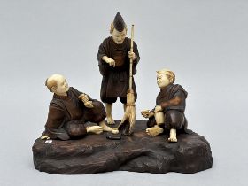 Japanese okimono 'drinking company', Meiji period (signed)