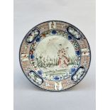 Japanese plate 'ladies with parasol' after a design by Cornelis Pronk, 18th century (*)