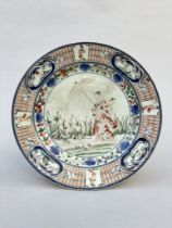 Japanese plate 'ladies with parasol' after a design by Cornelis Pronk, 18th century (*)