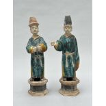 A pair of statues in terracotta 'servants', Ming dynasty (*)