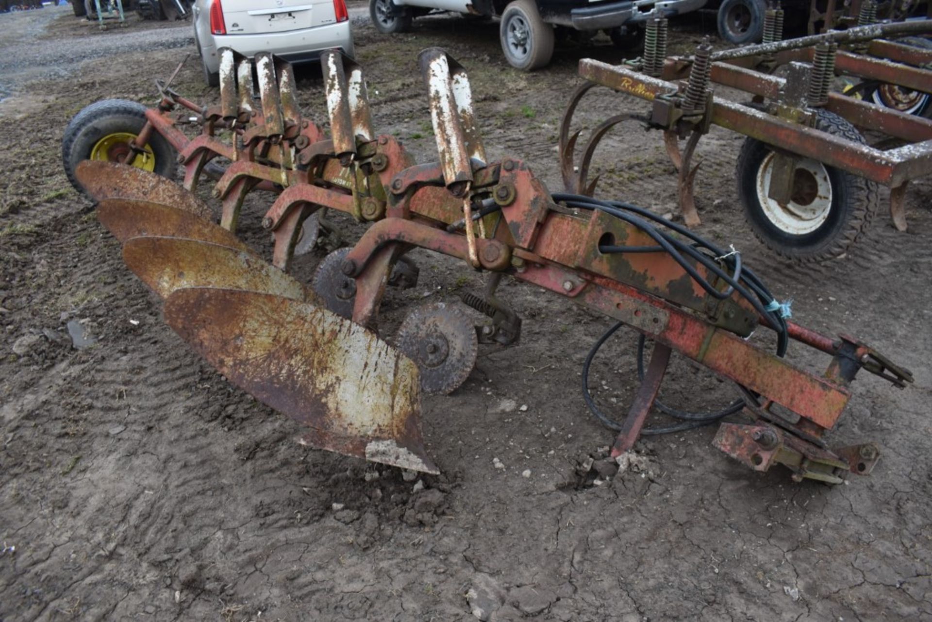 International 710 Automatic 4 Bottom 3 Point Plow