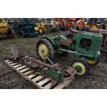 John Deere L Tractor with Sickle Bar Mower and Single Bottom Plow