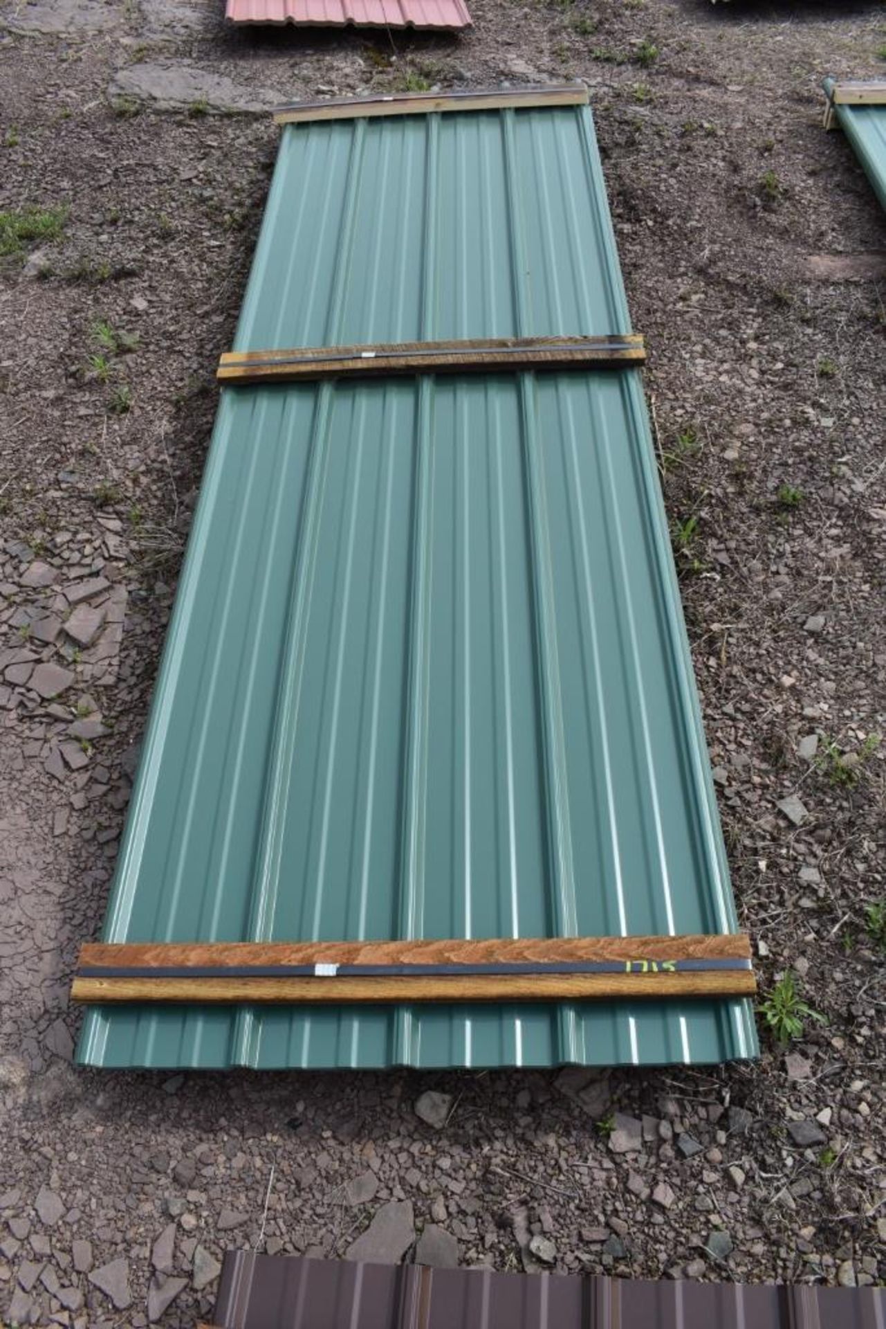 25 Pieces of 10' Sections of Green Corrugated Metal Paneling SOLD TIMES THE LINEAR FOOT