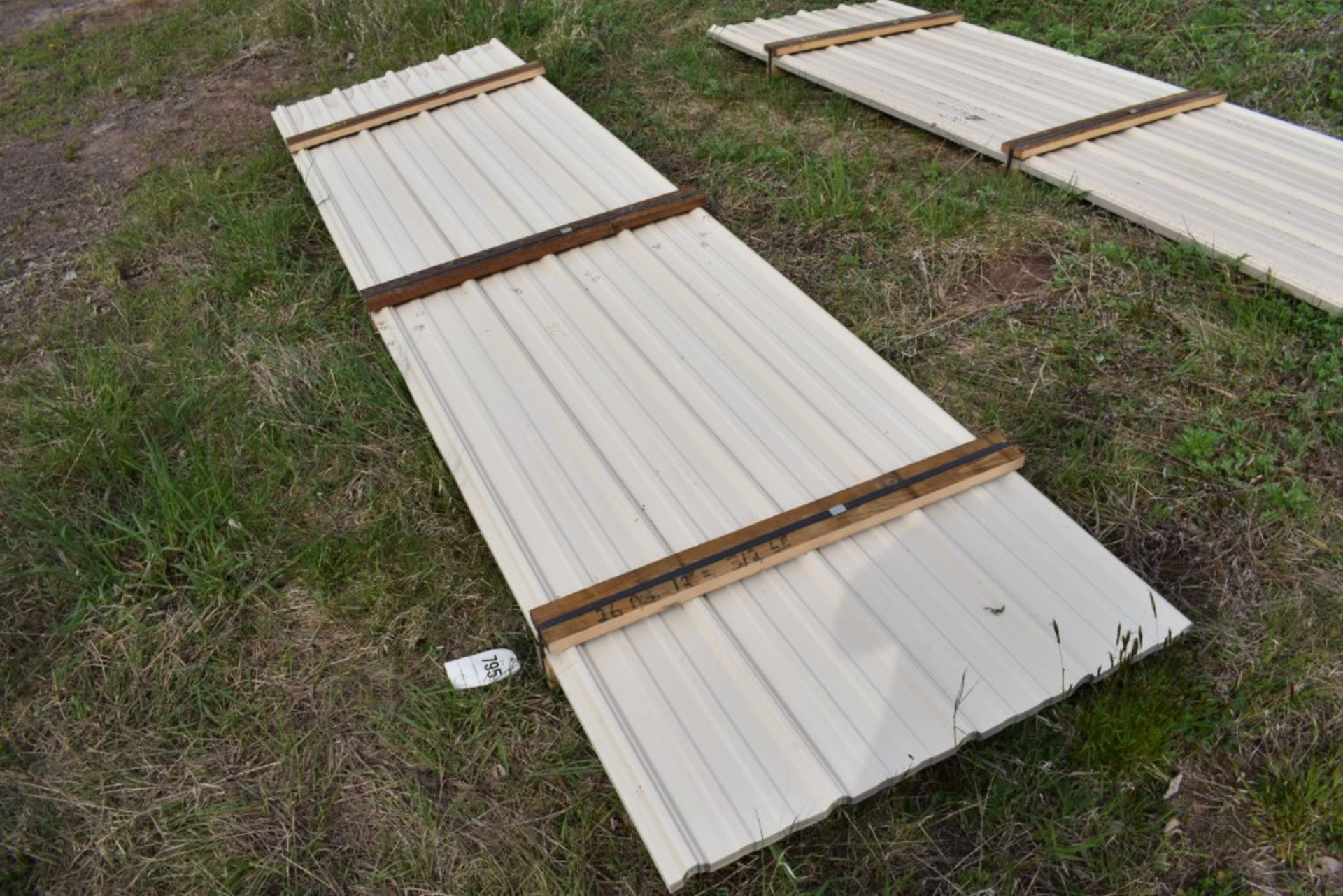 26 Pieces of 12' Sections of Cream Corrugated Metal Paneling SOLD TIMES THE LINEAR FOOT