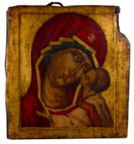 19TH/20TH CENTURY RUSSIAN ICON, of Madonna and Child, polychrome pigment and gilding on wood