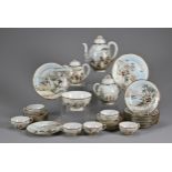 A JAPANESE PORCELAIN TEA SERVICE, CIRCA 1900. To include a teapot, milk jug, sugar pot, two larger