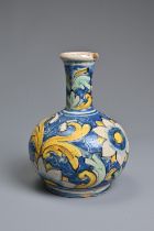 A CALTAGIRONE MAIOLICA BOTTLE-SHAPED VASE, 17-18TH CENTURY. With tall neck, painted overall with