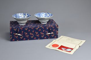 A PAIR OF CHINESE BLUE AND WHITE PORCELAIN BOWLS, QING DYNASTY. Each with stylised floral