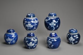 SIX CHINESE BLUE AND WHITE PORCELAIN PRUNUS JARS AND COVERS, 19/20TH CENTURY. Each of globular
