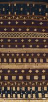 AN INDONESIAN SUMATRAN LAMPUNG CEREMONIAL GOLD THREAD TAPIS SARONG, EARLY 20TH CENTURY.