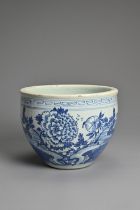 A CHINESE BLUE AND WHITE PORCELAIN JARDINIERE, 19TH CENTURY. Decorated with a garden scene under a