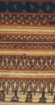 AN INDONESIAN SUMATRAN LAMPUNG CEREMONIAL GOLD THREAD TAPIS SARONG, EARLY 20TH CENTURY.