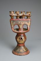 A PAINTED BERBER OIL LAMP, KABYLIA ALGERIA, EARLY 20TH CENTURY.