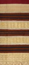 AN INDONESIAN SUMATRAN LAMPUNG CEREMONIAL GOLD AND SILVER THREAD TAPIS SARONG, EARLY 20TH CENTURY.