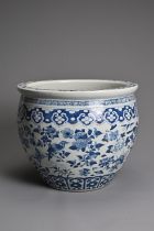 A LARGE CHINESE BLUE AND WHITE PORCELAIN JARDINIERE, 19TH CENTURY. Decorated with birds, butterflies