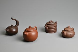FOUR CHINESE YIXING POTTERY TEAPOTS, 20TH CENTURY OR LATER. Of varying sizes and forms each with
