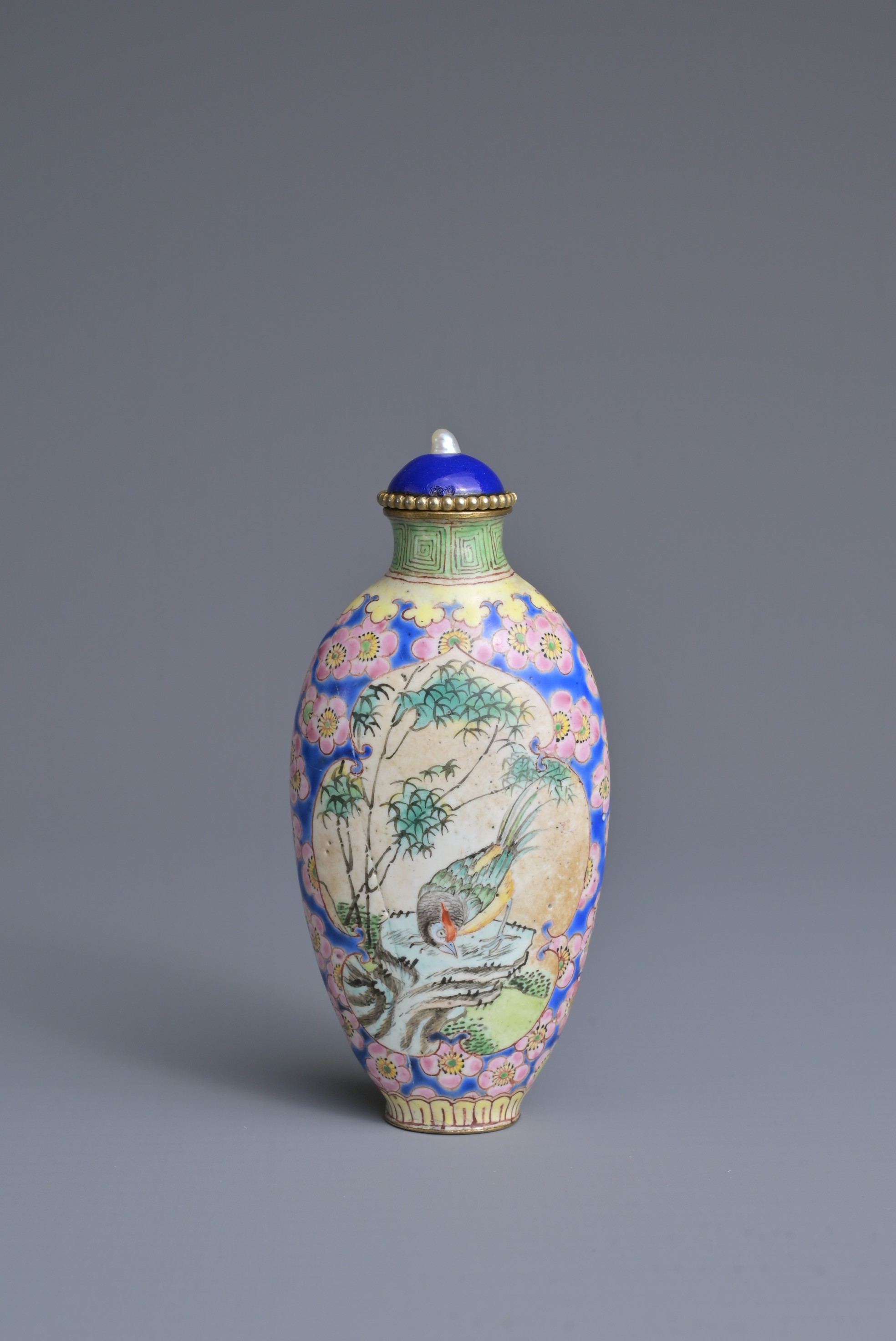 A CHINESE PAINTED ENAMEL SNUFF BOTTLE, QING DYNASTY. Tall ovoid form decorated with cartouche panels - Image 4 of 7
